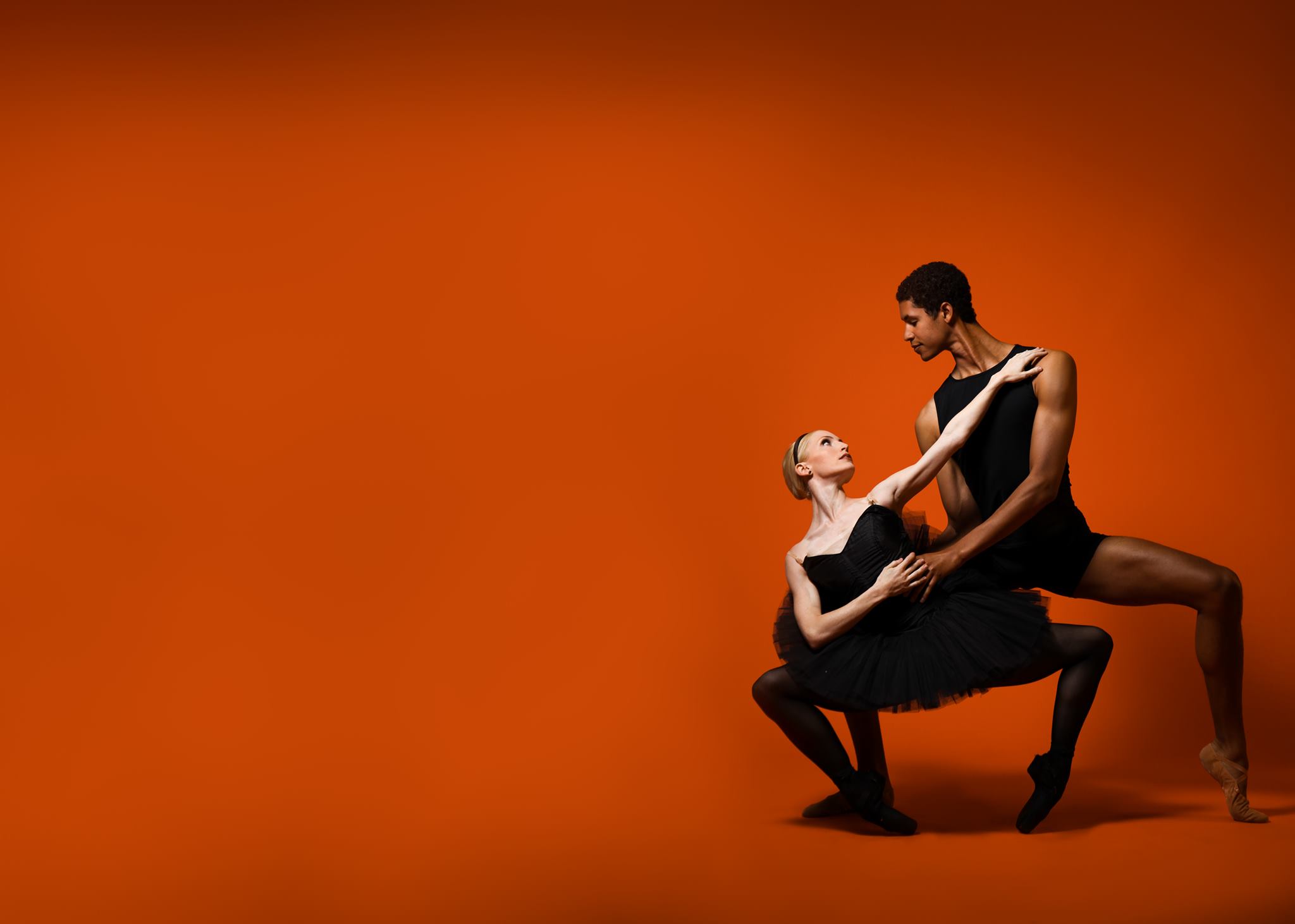 Dancers on Orange Background