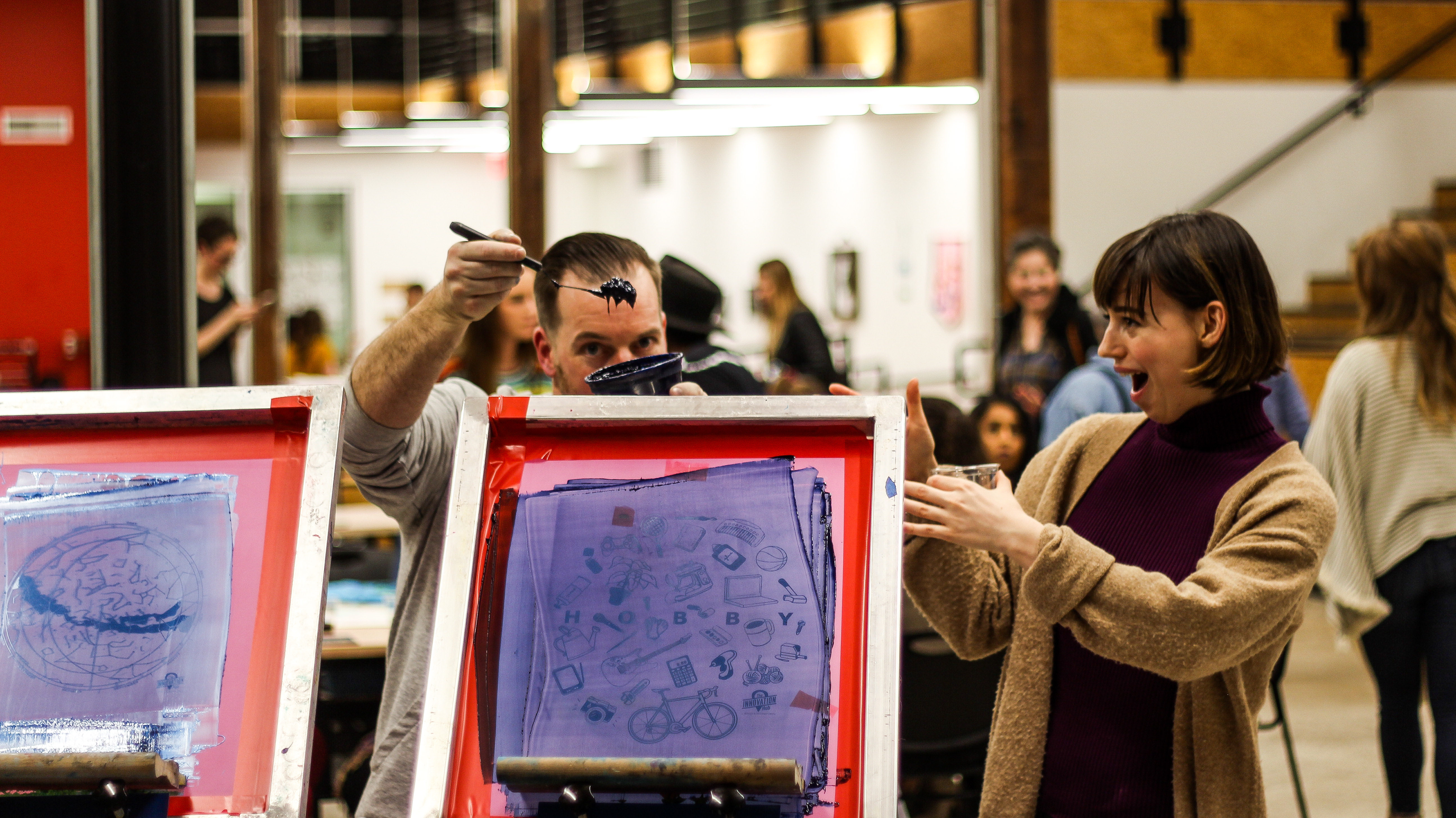 Artists looking at ink 