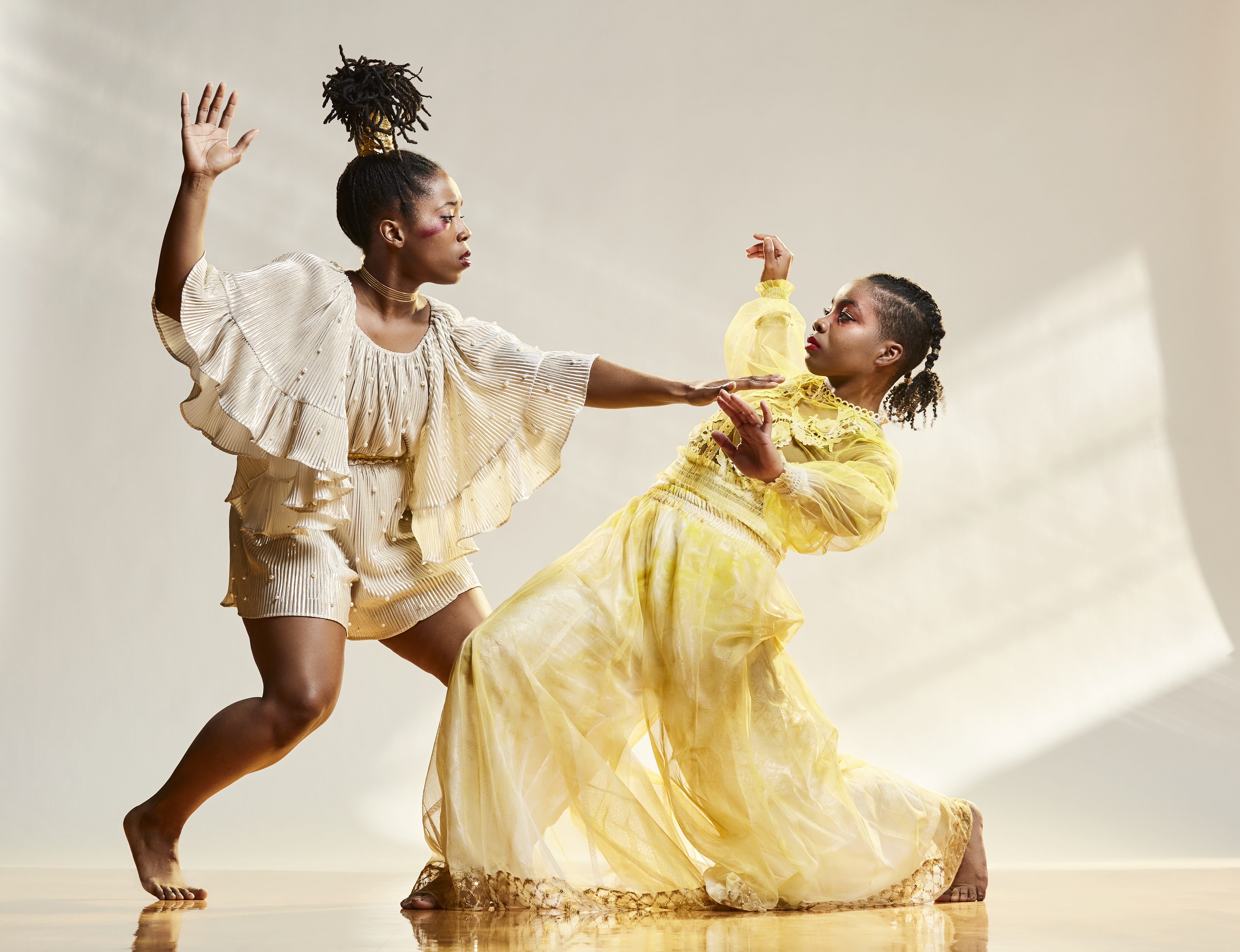 Two dancers mid-performances 