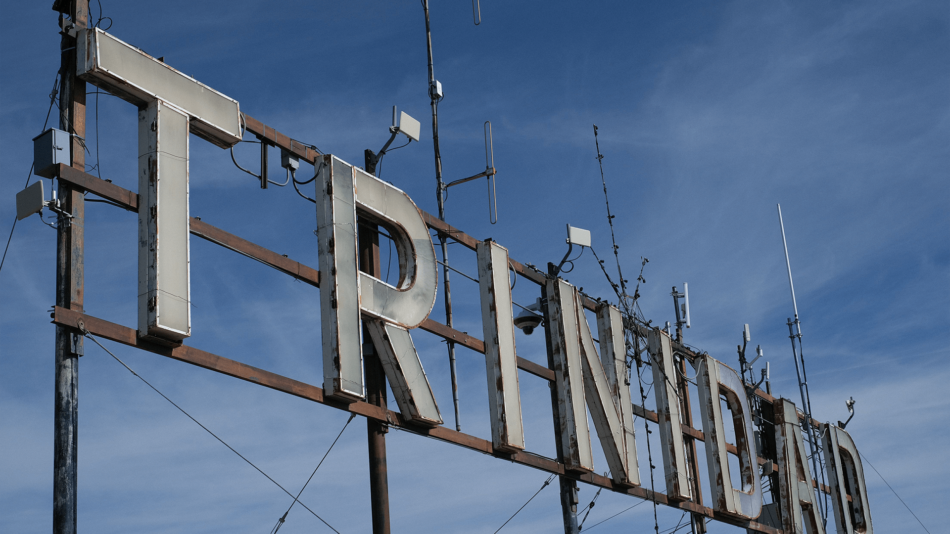 The iconic Trinidad sign on top of Simpson’s Rest overlooking the city