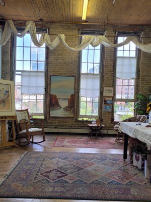 interior of studio #232 with brick walls and natural light