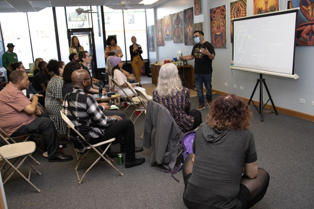 Attendees listening to presentations.