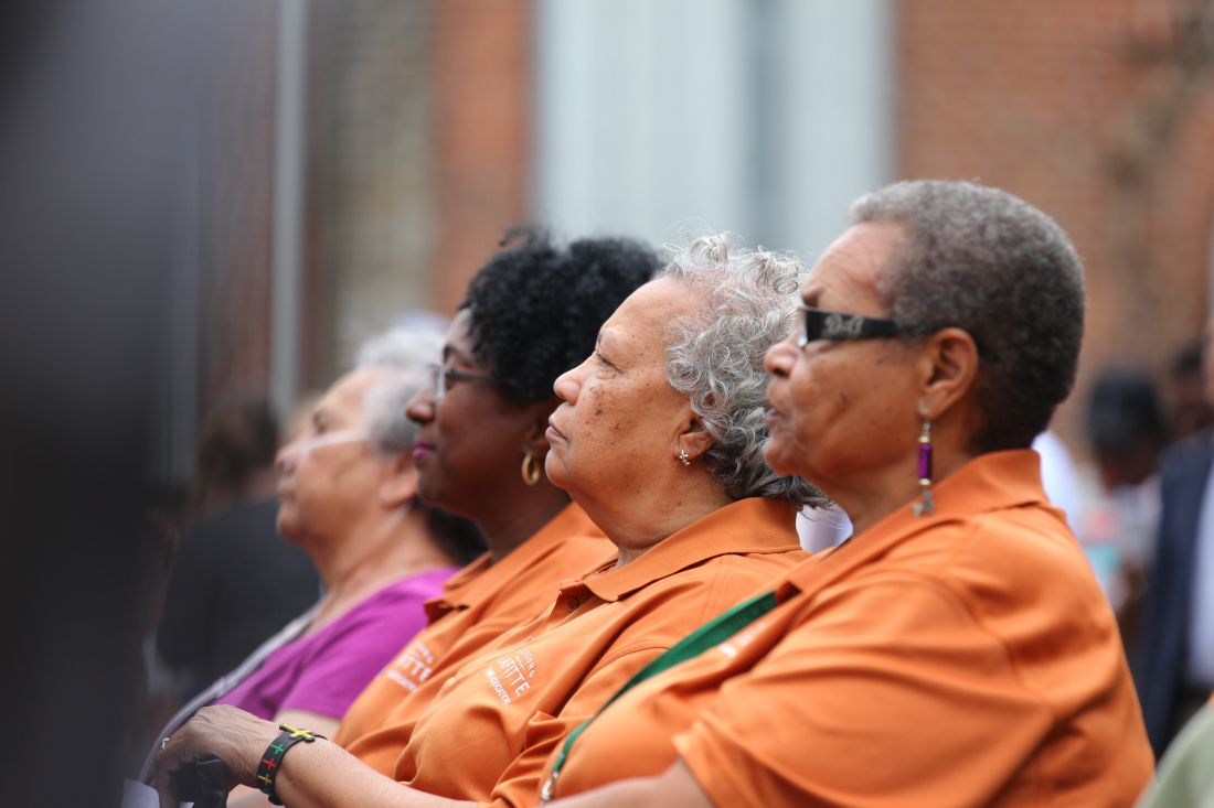 Audience watching the ground breaking ceremony.