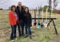 From Left to Right: Lakota Funds Executive Director Tawney Brunsch, Artspace President Kelley Lindquist, and First Peoples Fund President Lori Pourier pose with artist-designed shovels at the Oglala Lakota Artspace Groundbreaking. September 2018.