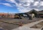 Empty lot with heavy machinery after building demolition at 1st and D Streets