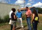 Group of people chatting at a site visit.